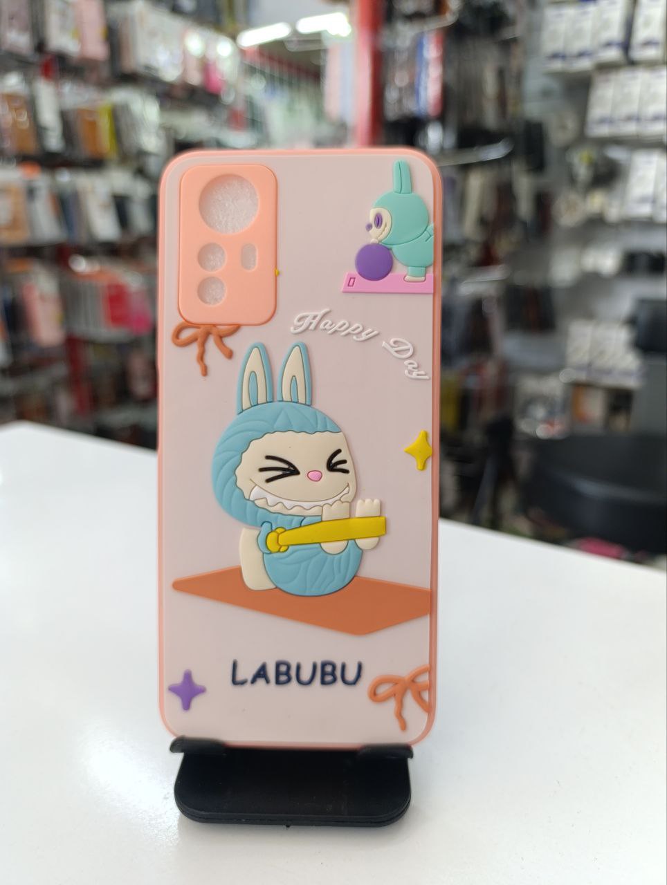 قاب طرح عروسکی labubu گلبهی xiaomi redmi note 12s